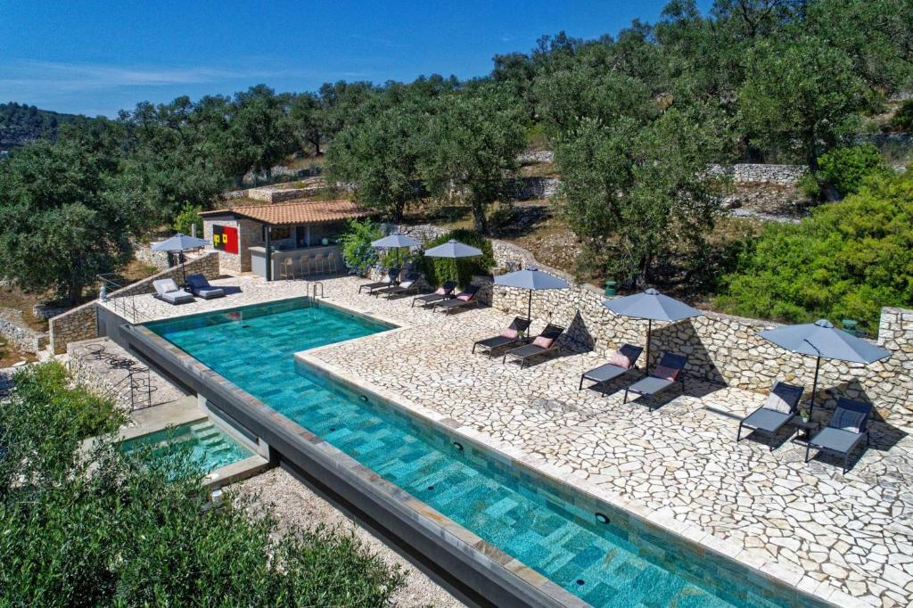 Bazén v ubytování Paxoi Resort - Adult-Only nebo v jeho okolí