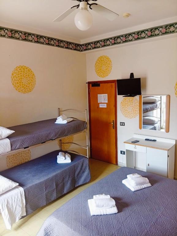 Postel nebo postele na pokoji v ubytování Smile Beach Hotel Nuova Gestione
