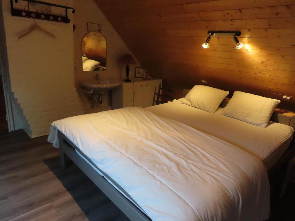 Postel nebo postele na pokoji v ubytování La Quitapenas