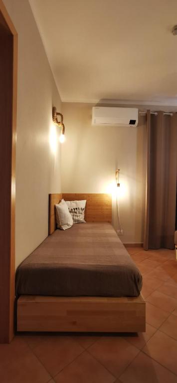 Postel nebo postele na pokoji v ubytování Casa Duci