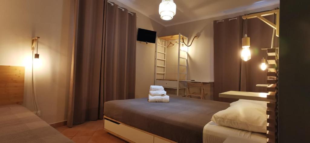 Postel nebo postele na pokoji v ubytování Casa Duci