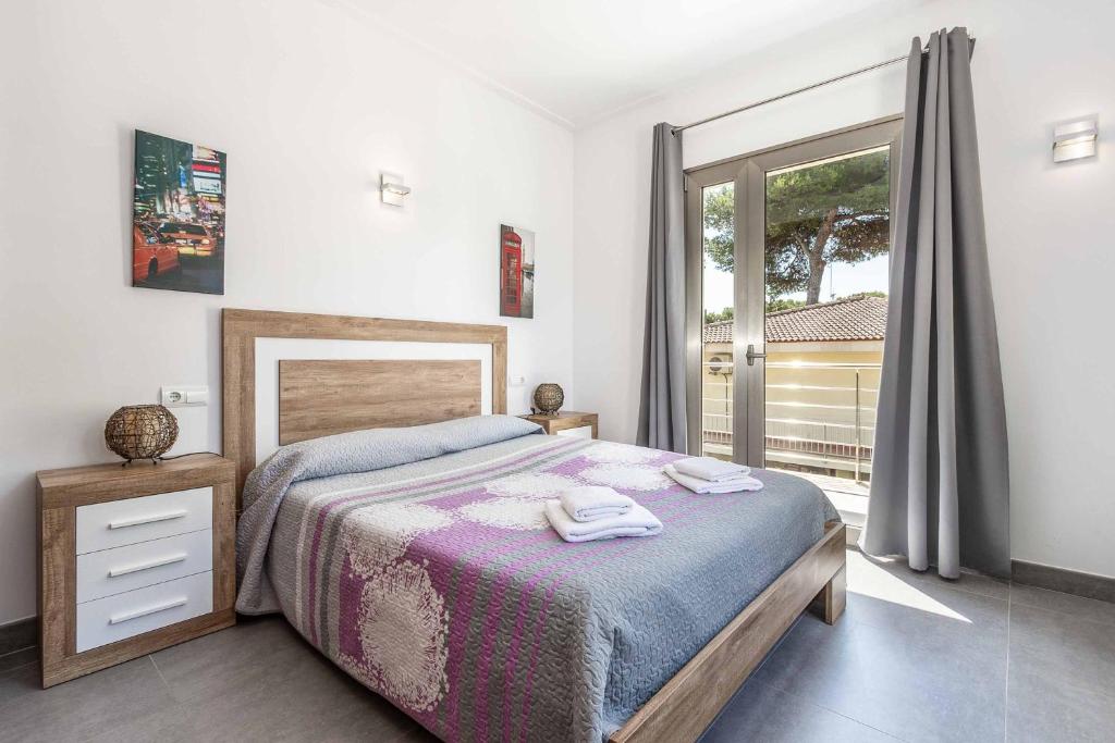 Postel nebo postele na pokoji v ubytování Villa Albufera