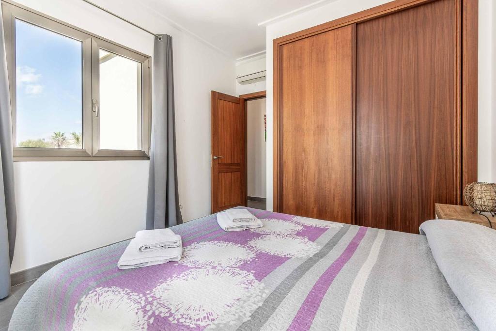 Postel nebo postele na pokoji v ubytování Villa Albufera