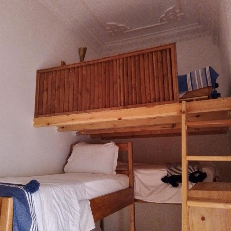 Postel nebo postele na pokoji v ubytování Hostel Capital