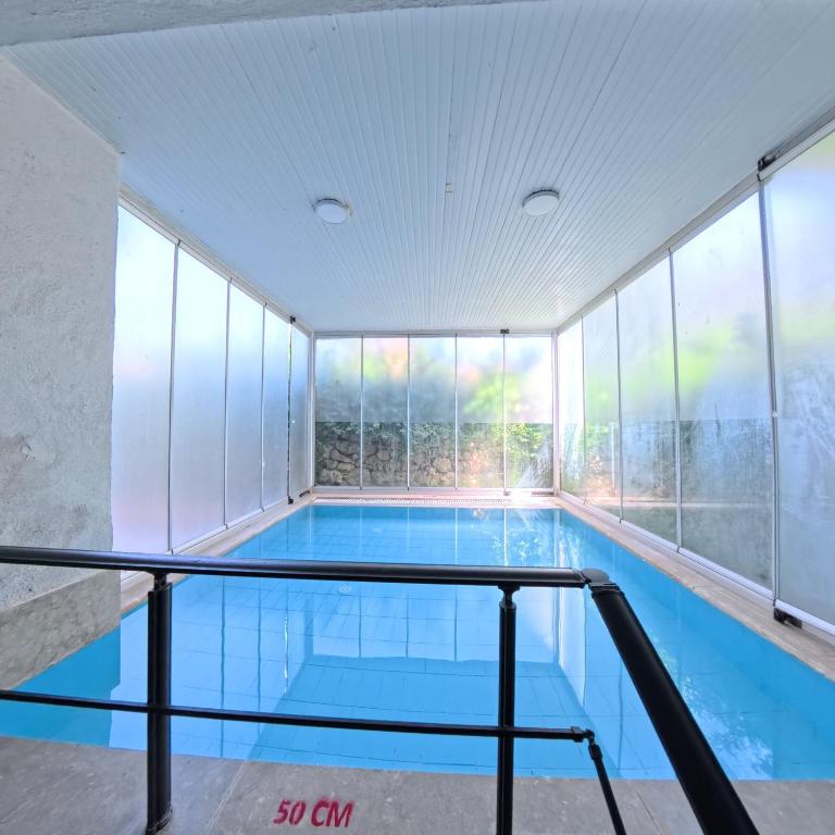 Bazén v ubytování Naturalis Pamukkale Otel nebo v jeho okolí