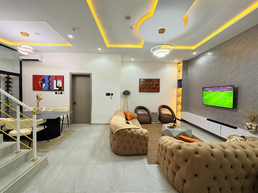 TV a/nebo společenská místnost v ubytování Flavour condo