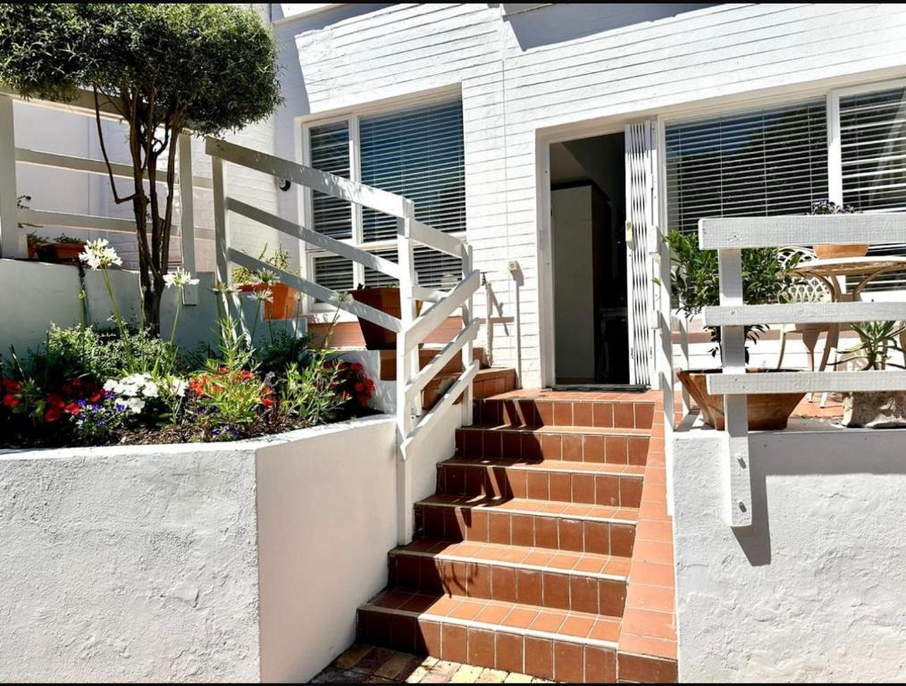 Balkón nebo terasa v ubytování Garden Beach Cottage