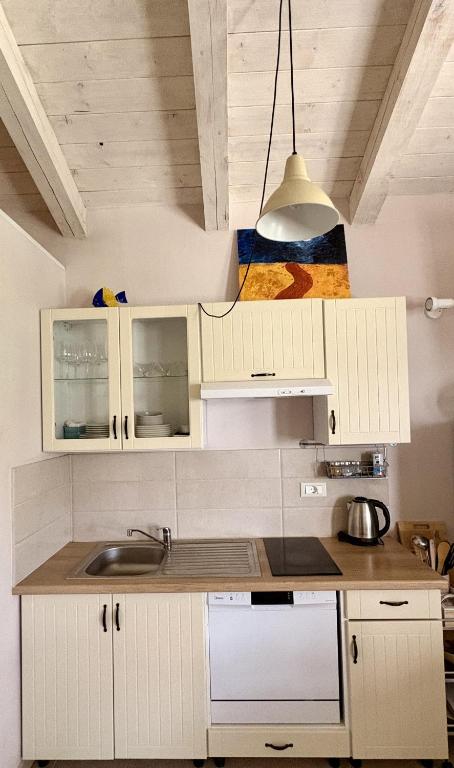 Kuchyňa alebo kuchynka v ubytovaní Apartment Dulcis Domus
