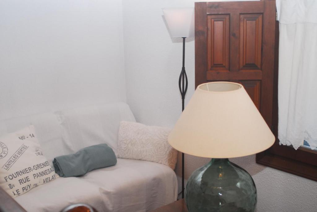 Cama o camas de una habitación en Hostal Puente Deva
