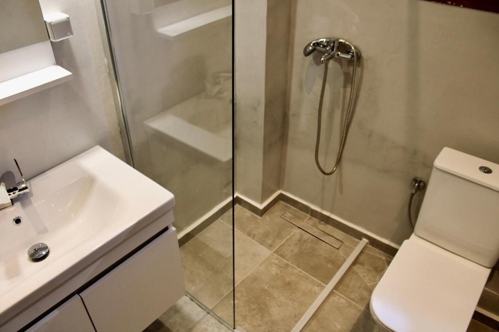 Koupelna v ubytování Cicones Boutique Apartments