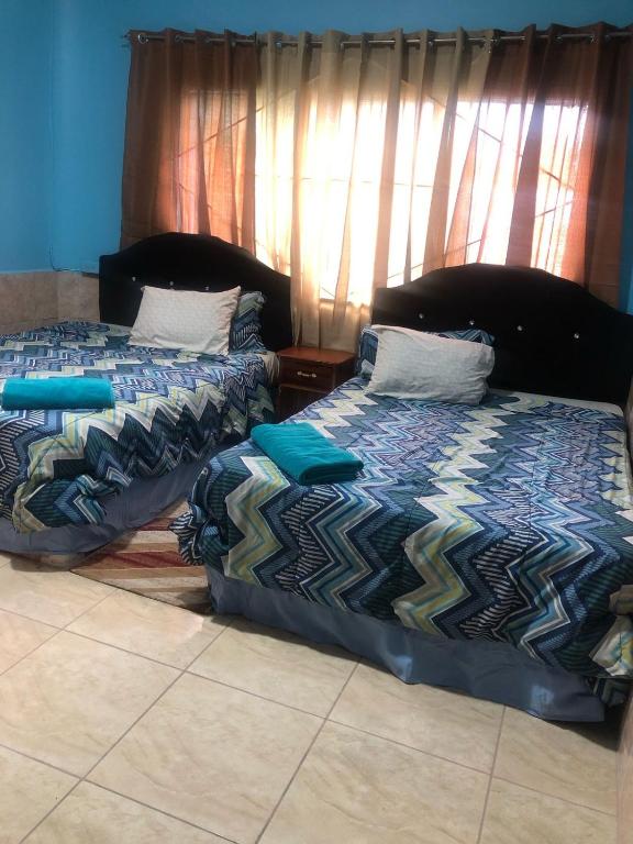 Caribbean Tourist Villa - Quadruple Chambre