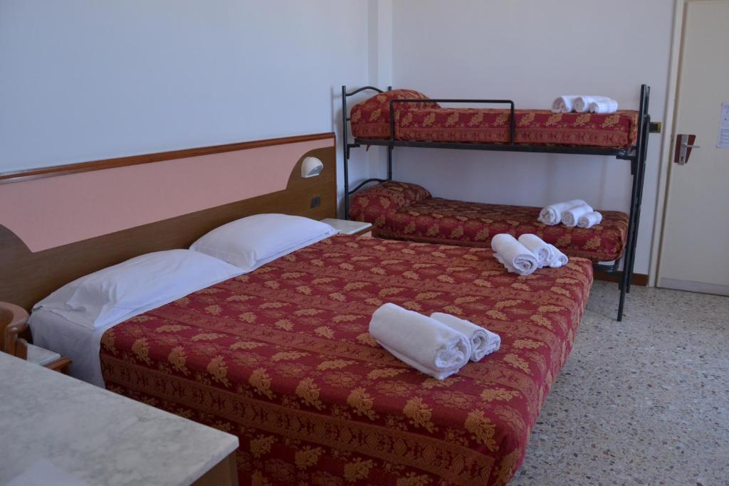 Postel nebo postele na pokoji v ubytování Hotel Artide