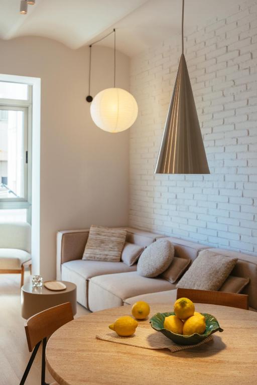 A seating area at Newly Renovated Stylish Eixample - Great Location