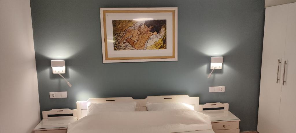 A bed or beds in a room at Papadioti Apartments
