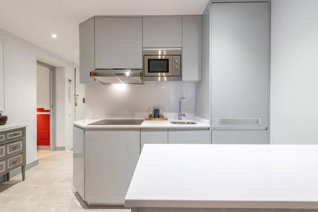 Kuchyň nebo kuchyňský kout v ubytování Sophisticated brand new flat