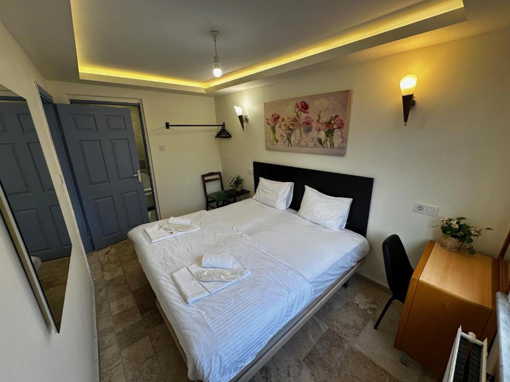 Postel nebo postele na pokoji v ubytování İstanbul PRENS HOTEL