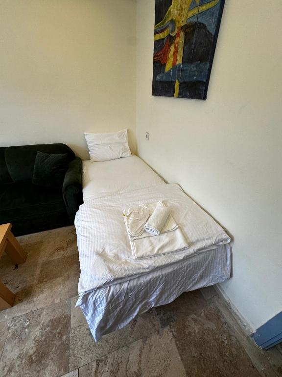 Postel nebo postele na pokoji v ubytování İstanbul PRENS HOTEL