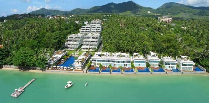 an aerial view of a resort on the beach at Daisy 2 Bed Amazing Seaview in Rawai Beach