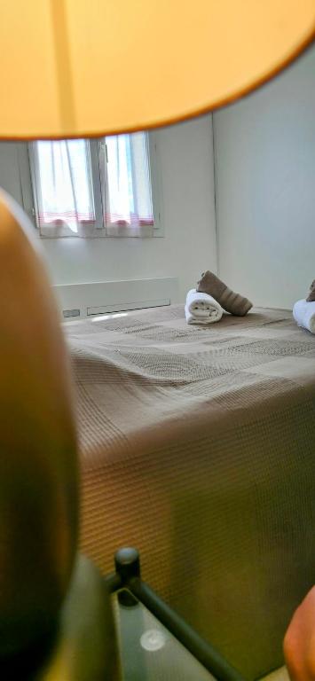 Ein Bett oder Betten in einem Zimmer der Unterkunft Gîte Palma, vue exceptionnelle vallée Provençale