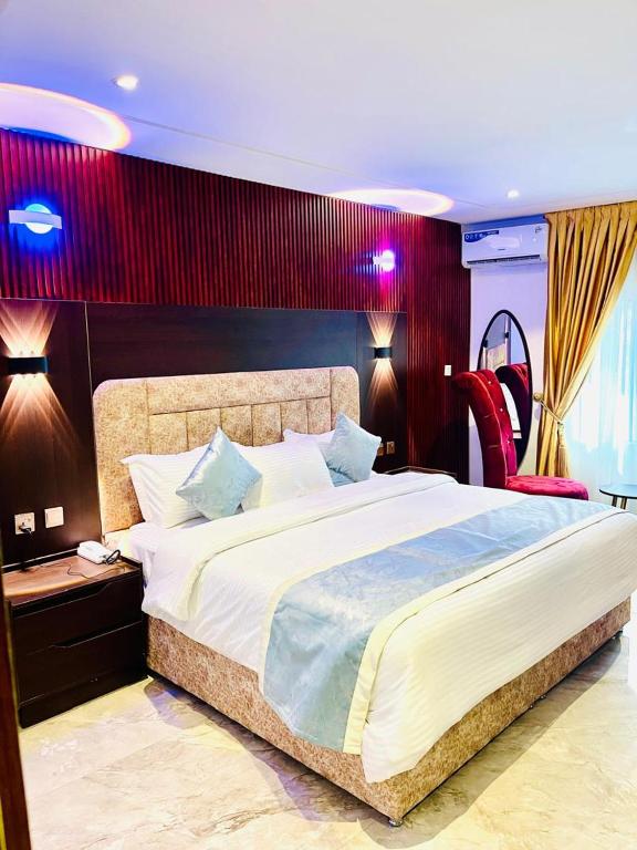Postel nebo postele na pokoji v ubytování ComeInn CAS Hotel