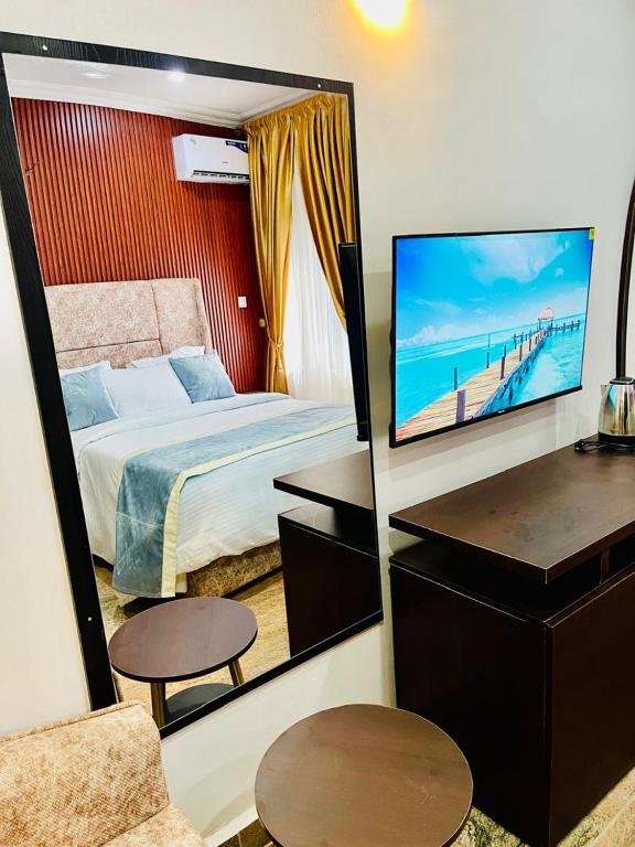 Postel nebo postele na pokoji v ubytování ComeInn CAS Hotel