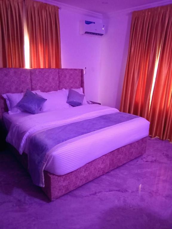 Postel nebo postele na pokoji v ubytování ComeInn CAS Hotel