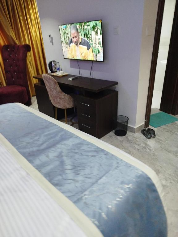 TV a/nebo společenská místnost v ubytování ComeInn CAS Hotel