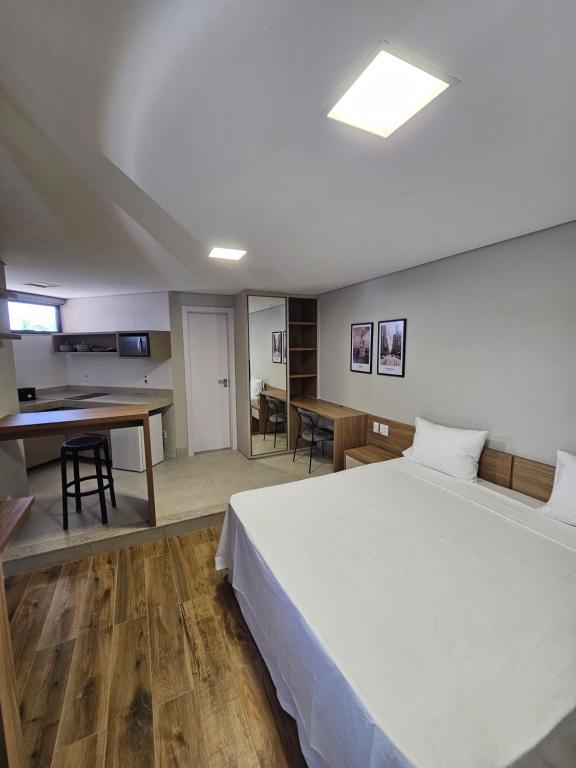 Postel nebo postele na pokoji v ubytování HG Studio Hotel