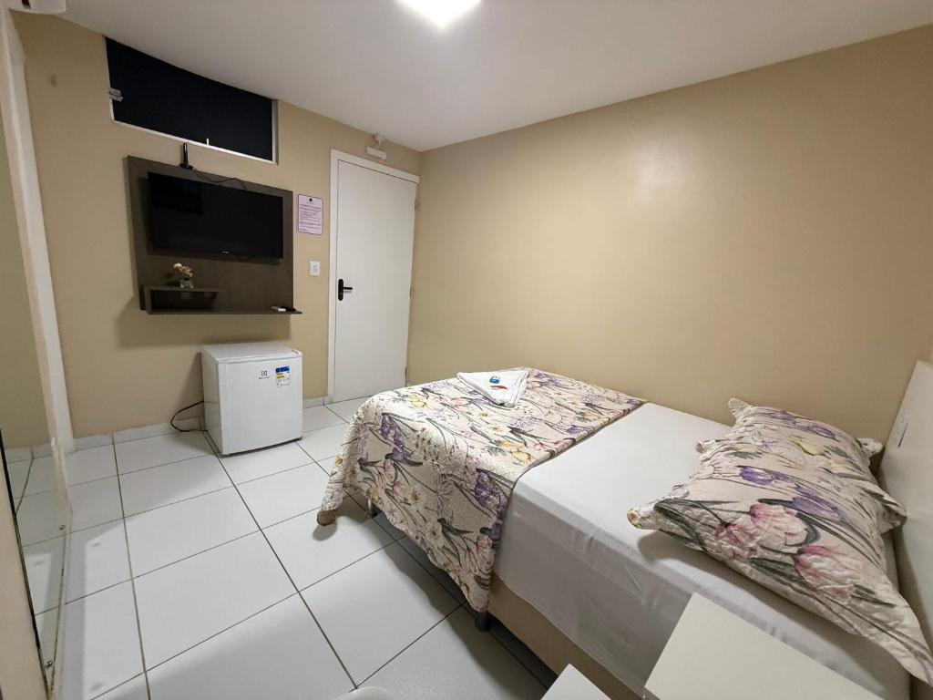 Postel nebo postele na pokoji v ubytování Roraima Apart Hotel