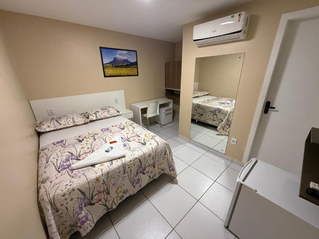 Postel nebo postele na pokoji v ubytování Roraima Apart Hotel