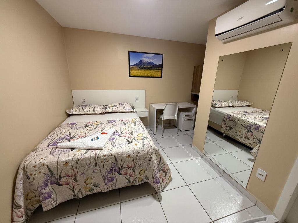Postel nebo postele na pokoji v ubytování Roraima Apart Hotel