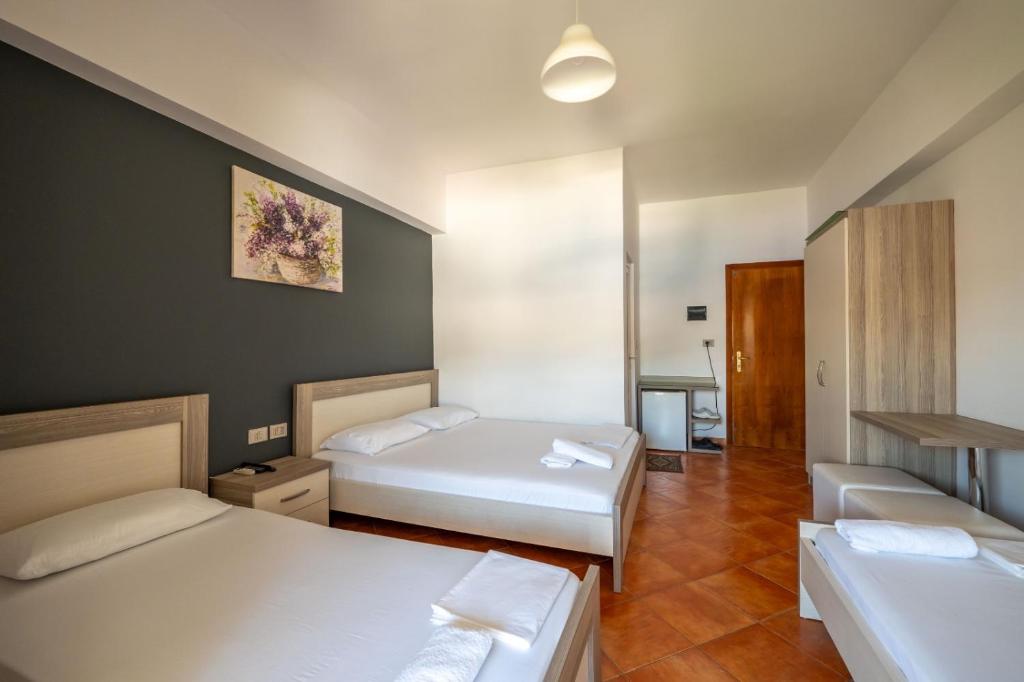 Postel nebo postele na pokoji v ubytování Classic Rooms