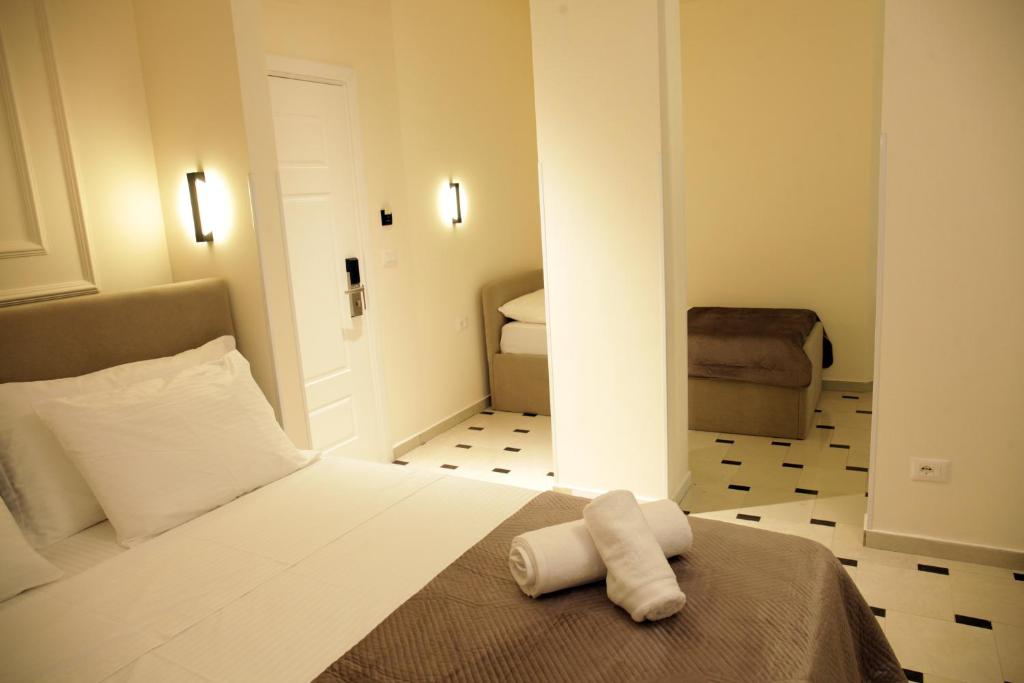 Ένα ή περισσότερα κρεβάτια σε δωμάτιο στο Mejsi Studio Apartment