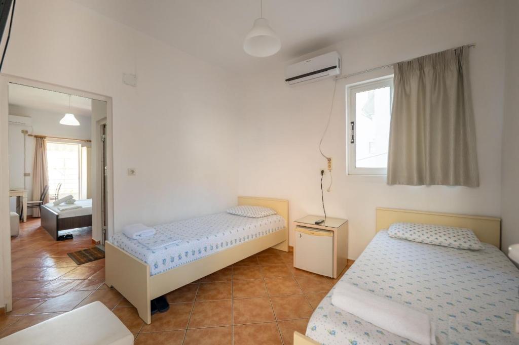 Postel nebo postele na pokoji v ubytování Classic Rooms