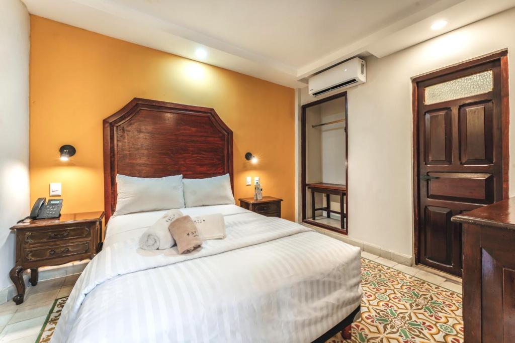 Postel nebo postele na pokoji v ubytování Hotel Real Toledo by Kavia