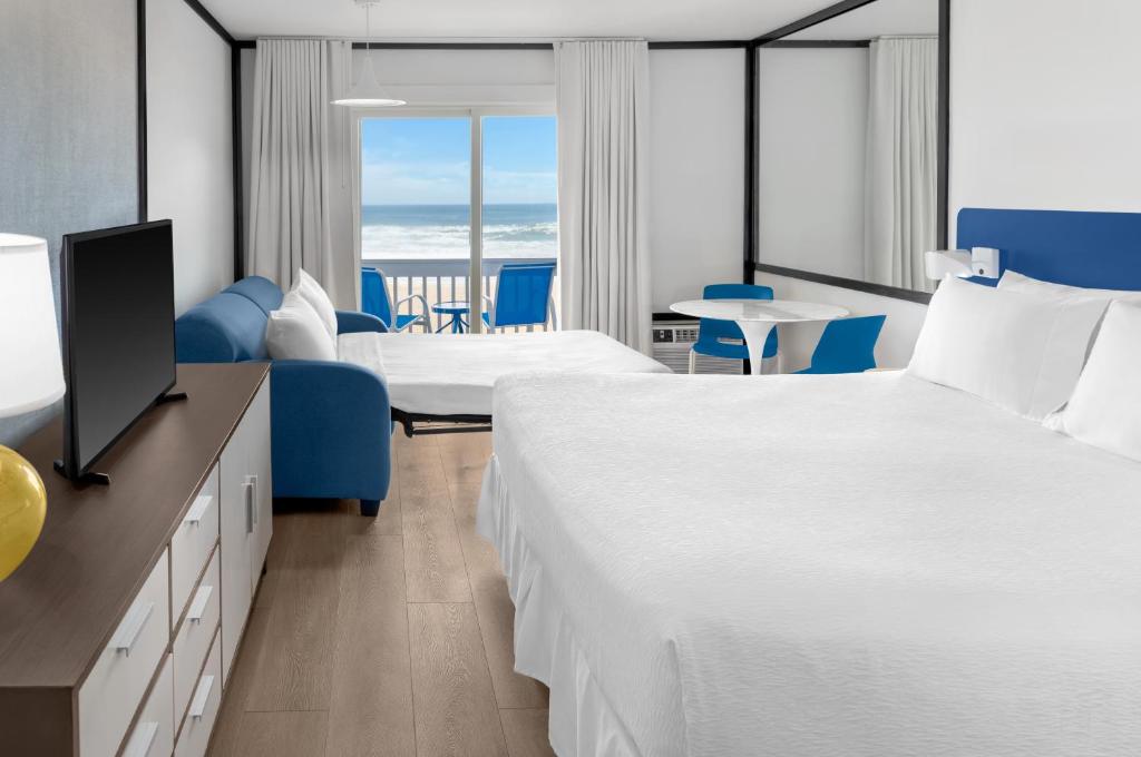 Postel nebo postele na pokoji v ubytování Montauk Blue Hotel