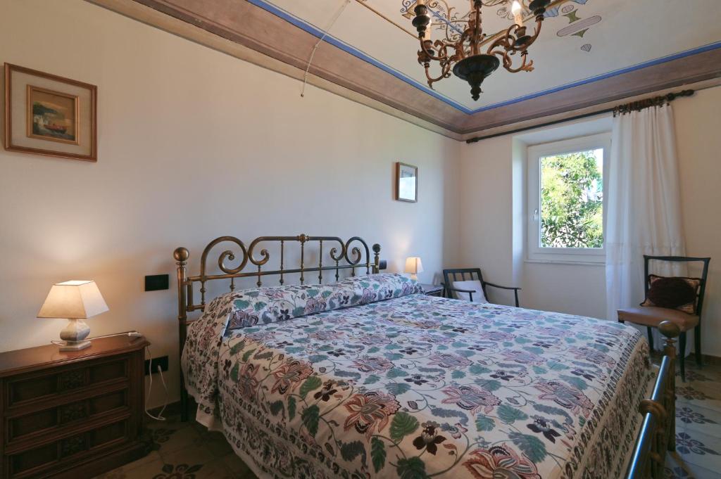 Postel nebo postele na pokoji v ubytování Casa e Mansarda delle Mura