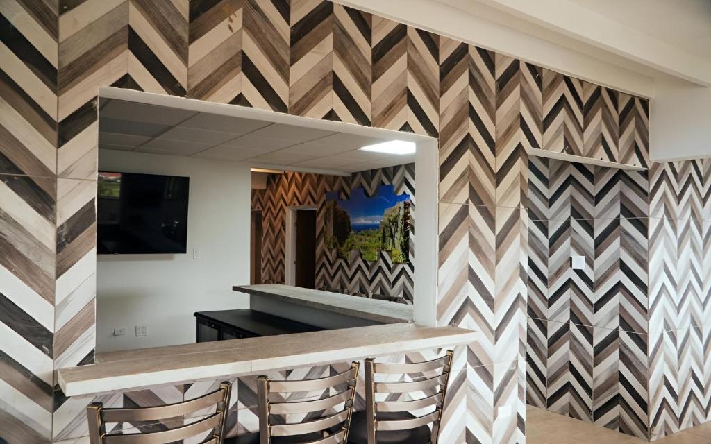 TV a/nebo společenská místnost v ubytování Saba Arawak Hotel