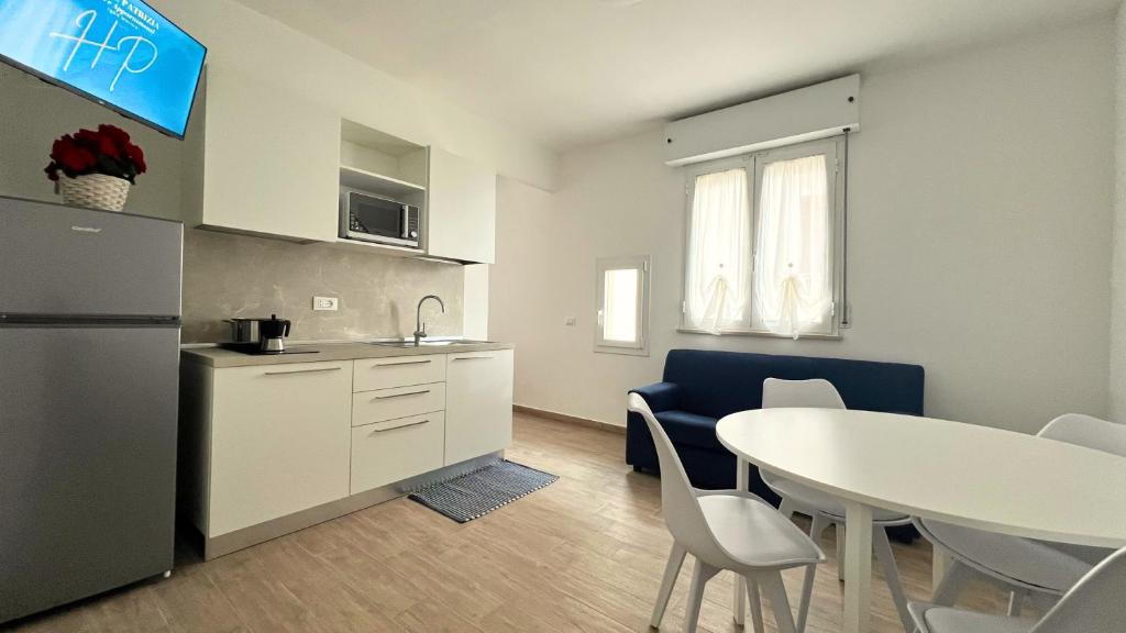 Kuchyň nebo kuchyňský kout v ubytování Hotel Patrizia - B&B e Appartamenti