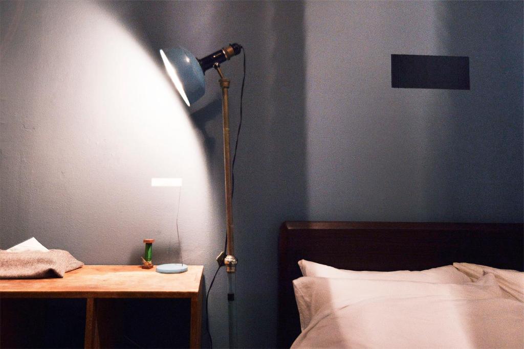 Postel nebo postele na pokoji v ubytování Apartment Hotel Shinjuku