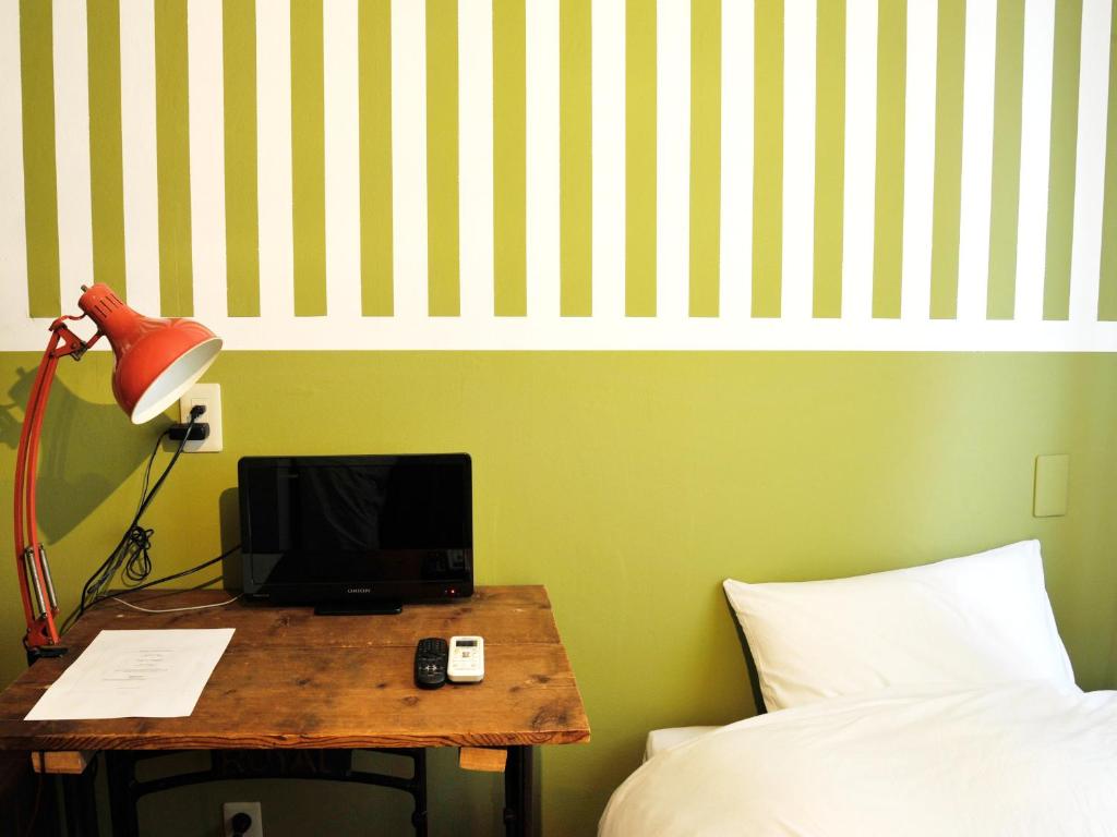 TV a/nebo společenská místnost v ubytování Apartment Hotel Shinjuku