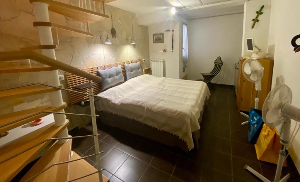 Postel nebo postele na pokoji v ubytování La casa di Anita