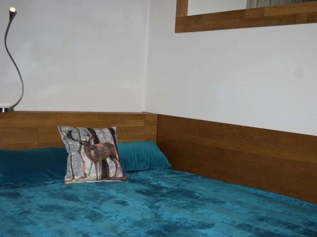 Postel nebo postele na pokoji v ubytování Abis Ferienwohnung Salzkammergut