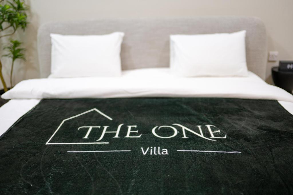 Voodi või voodid majutusasutuse TheOne Villa toas