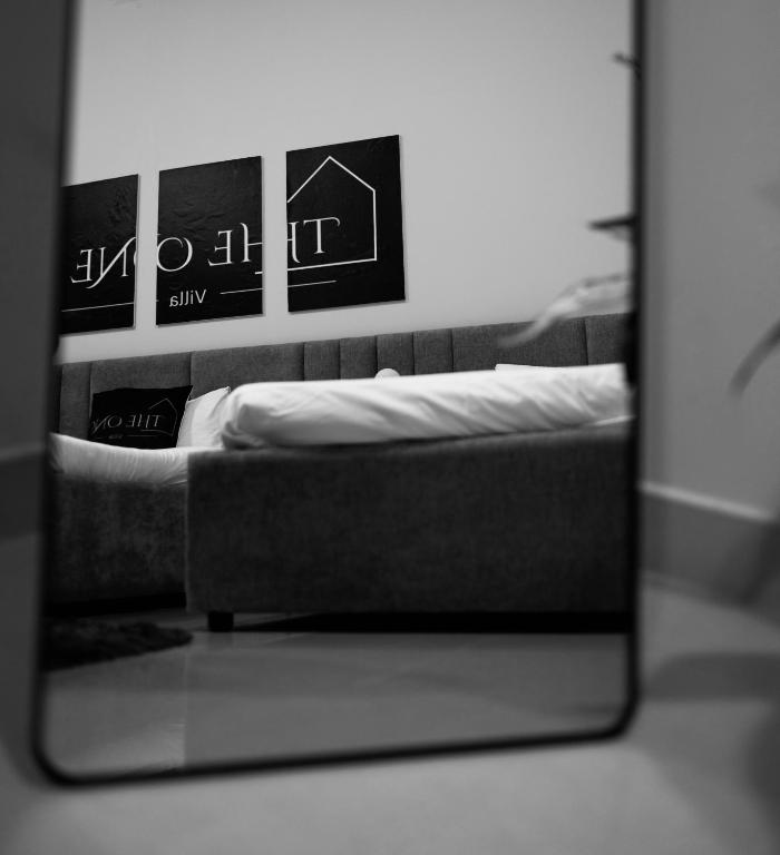 Voodi või voodid majutusasutuse TheOne Villa toas