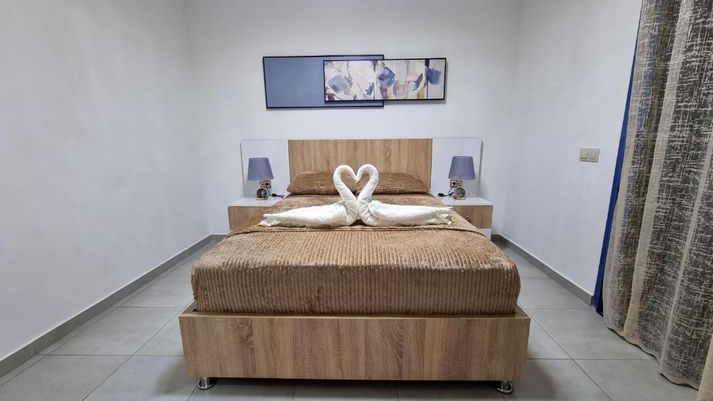 Postel nebo postele na pokoji v ubytování Appartement luxueux - Piscines, Plage 300m, Résidence fermée