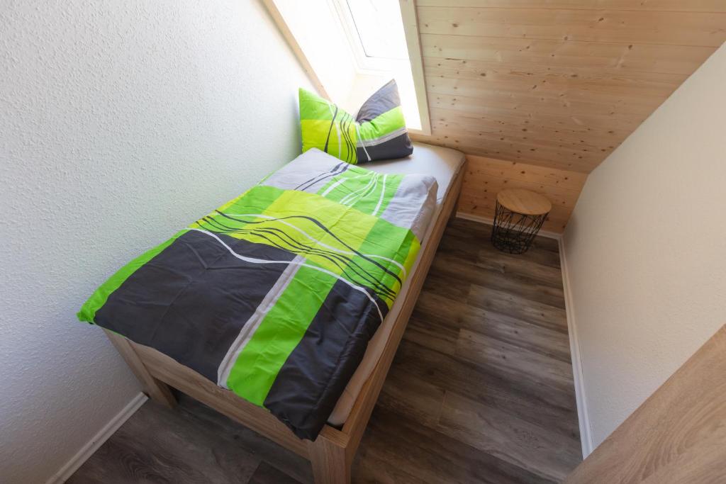Ein Bett oder Betten in einem Zimmer der Unterkunft Lewe`s Ferienwohnungen