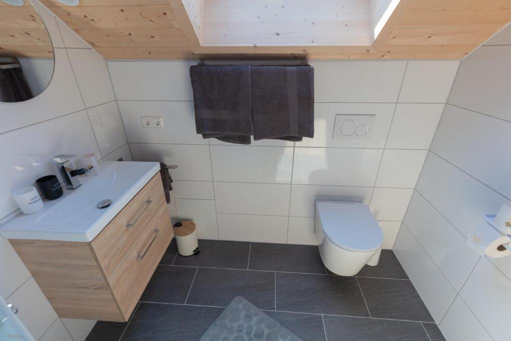 Ein Badezimmer in der Unterkunft Lewe`s Ferienwohnungen