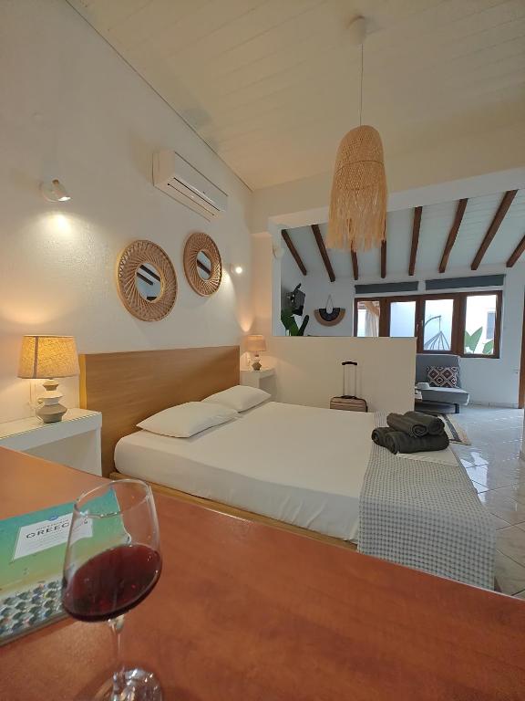 Postel nebo postele na pokoji v ubytování Del Sol Suites