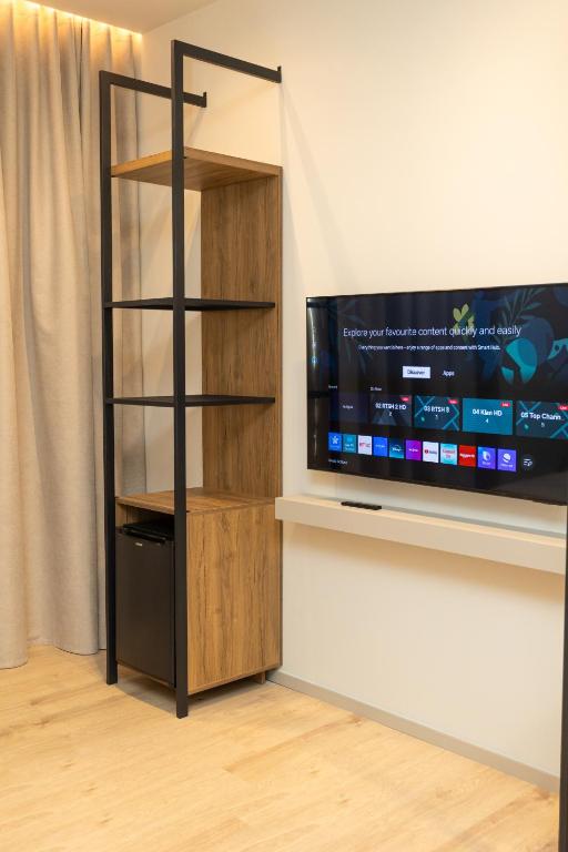 TV a/nebo společenská místnost v ubytování South Inn Hotel